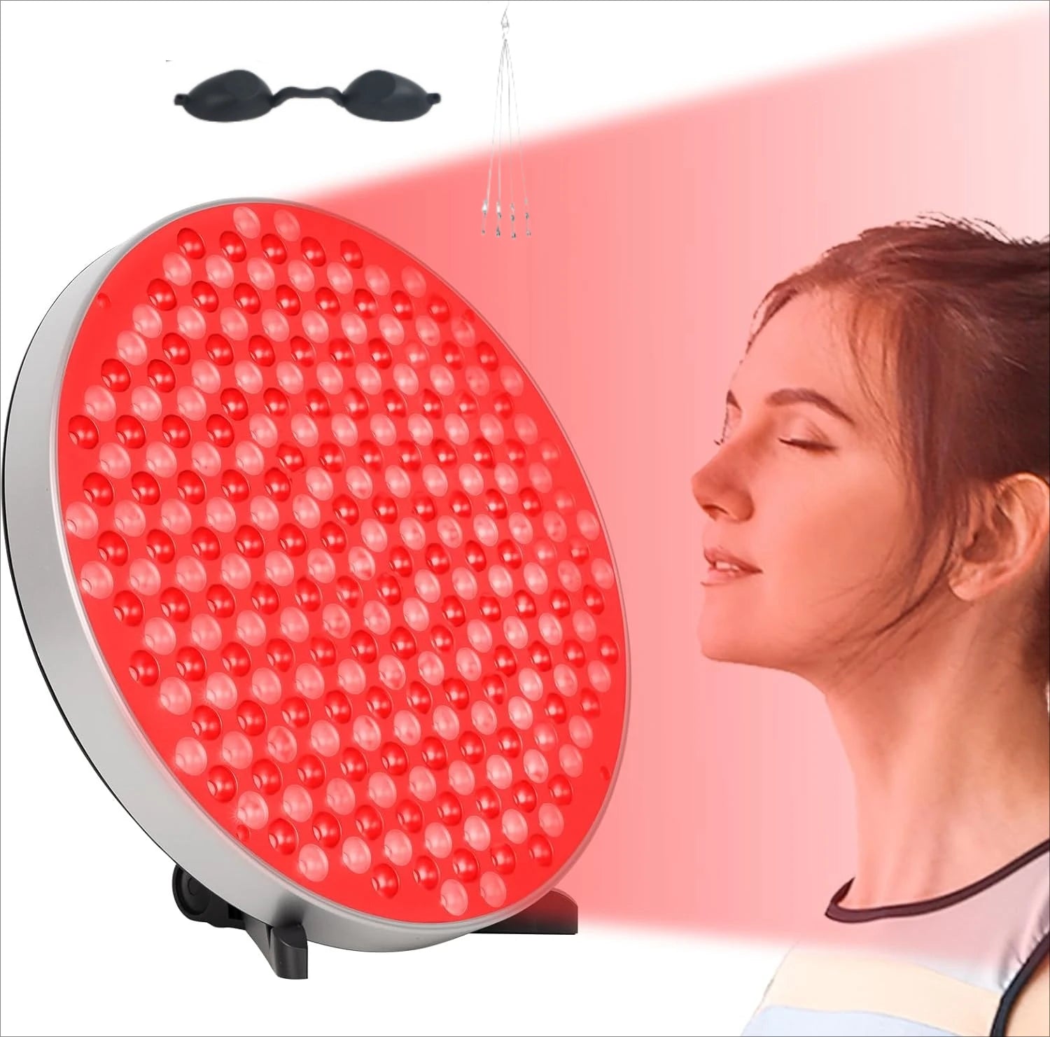 Person using red light therapy panel for facial treatment
